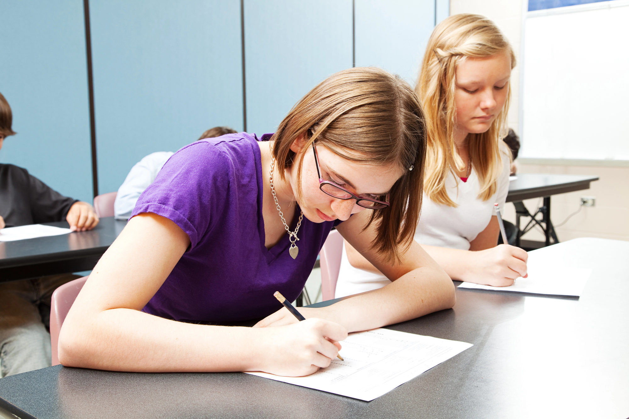 Two teenage girls taking their GCSEs